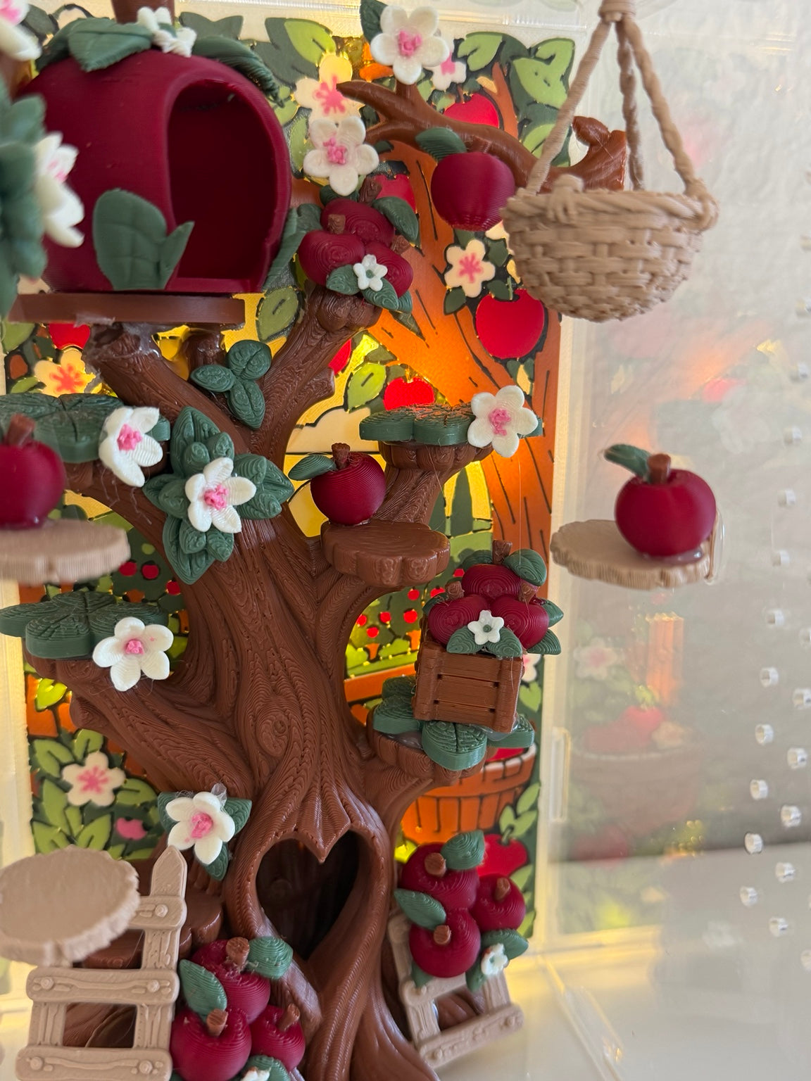Cobbler's Orchard apple tree climbing platforms and blossom details with backlighting